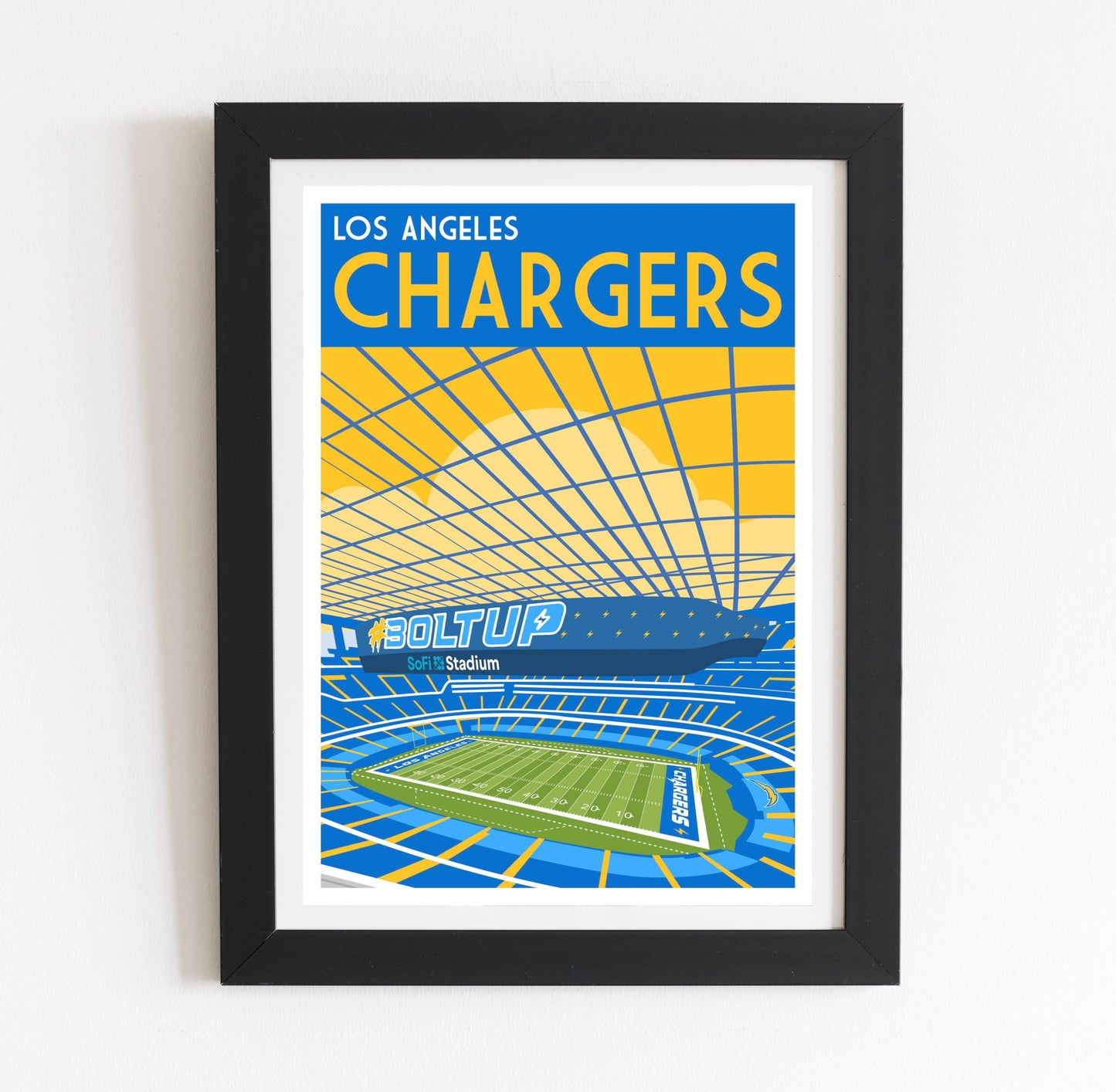 a framed poster of a stadium with the los angeles chargers on it