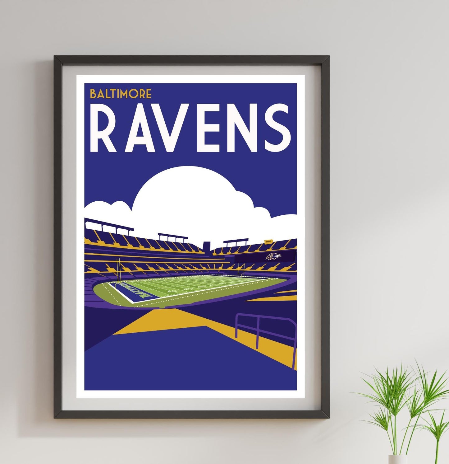 a framed poster of a football stadium