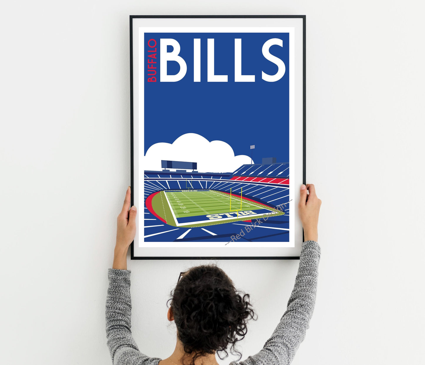 a woman holding up a poster of a tennis court