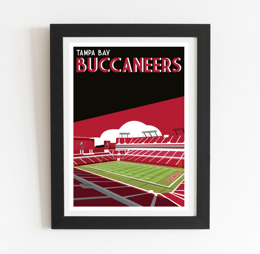 a framed poster of a stadium with a green field