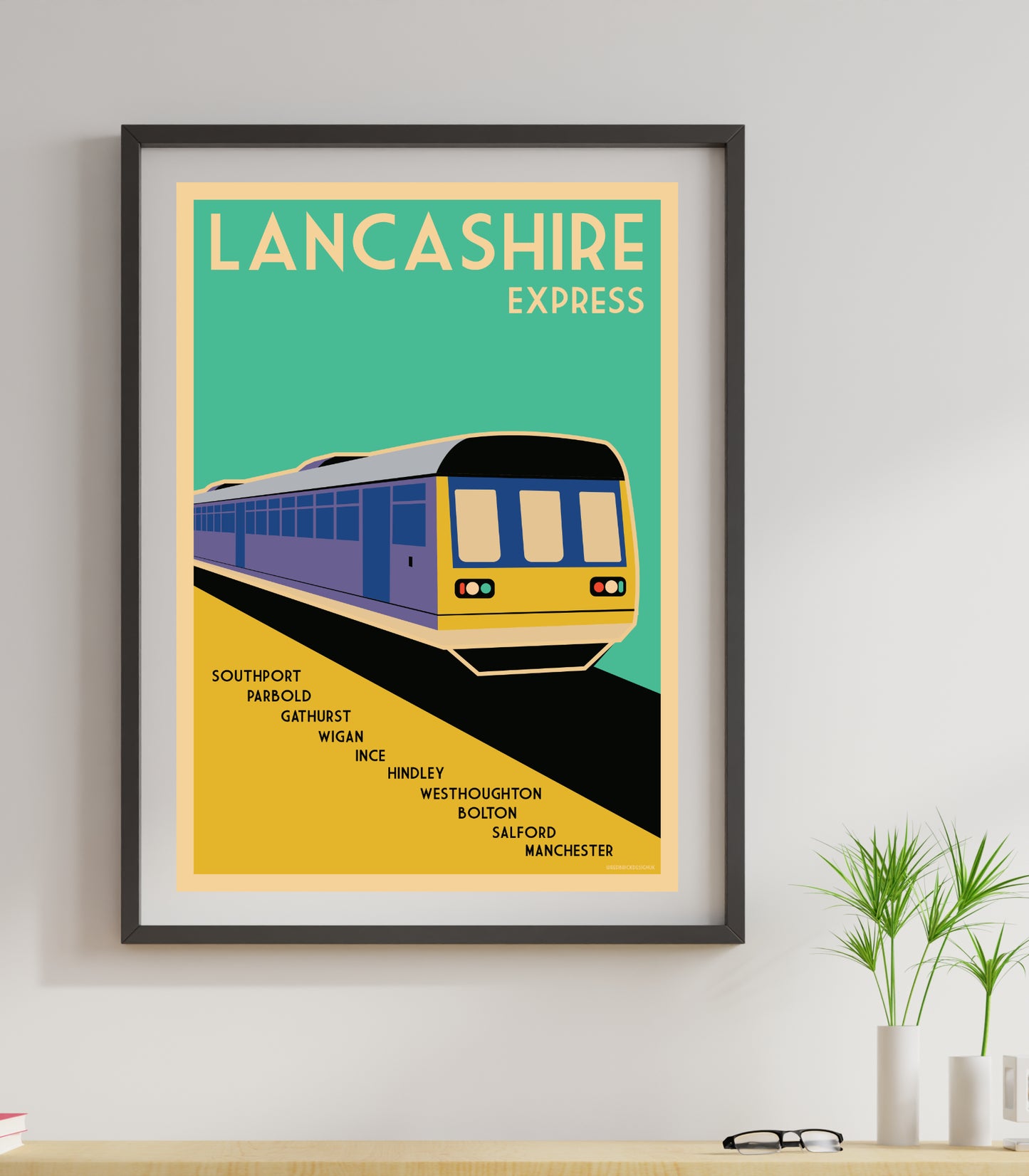 a poster of a train on a wall retro travel poster UK lancashire