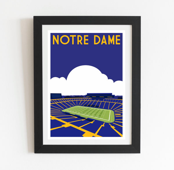 a framed poster of a stadium with a sky background