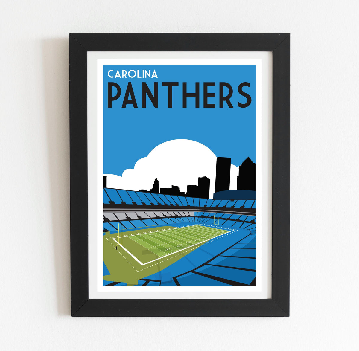 a framed poster of a stadium with a tennis court