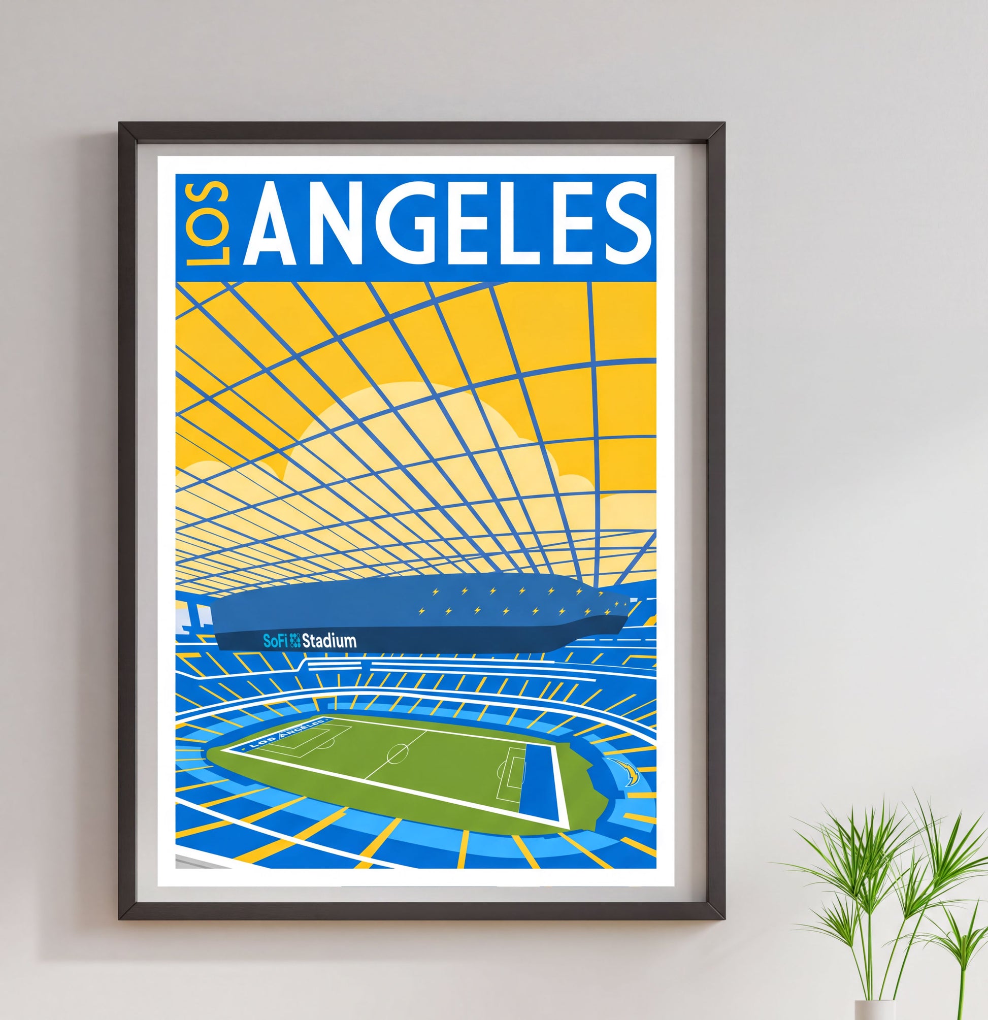 A framed poster depicting the SoCal Stadium in Los Angeles, California.