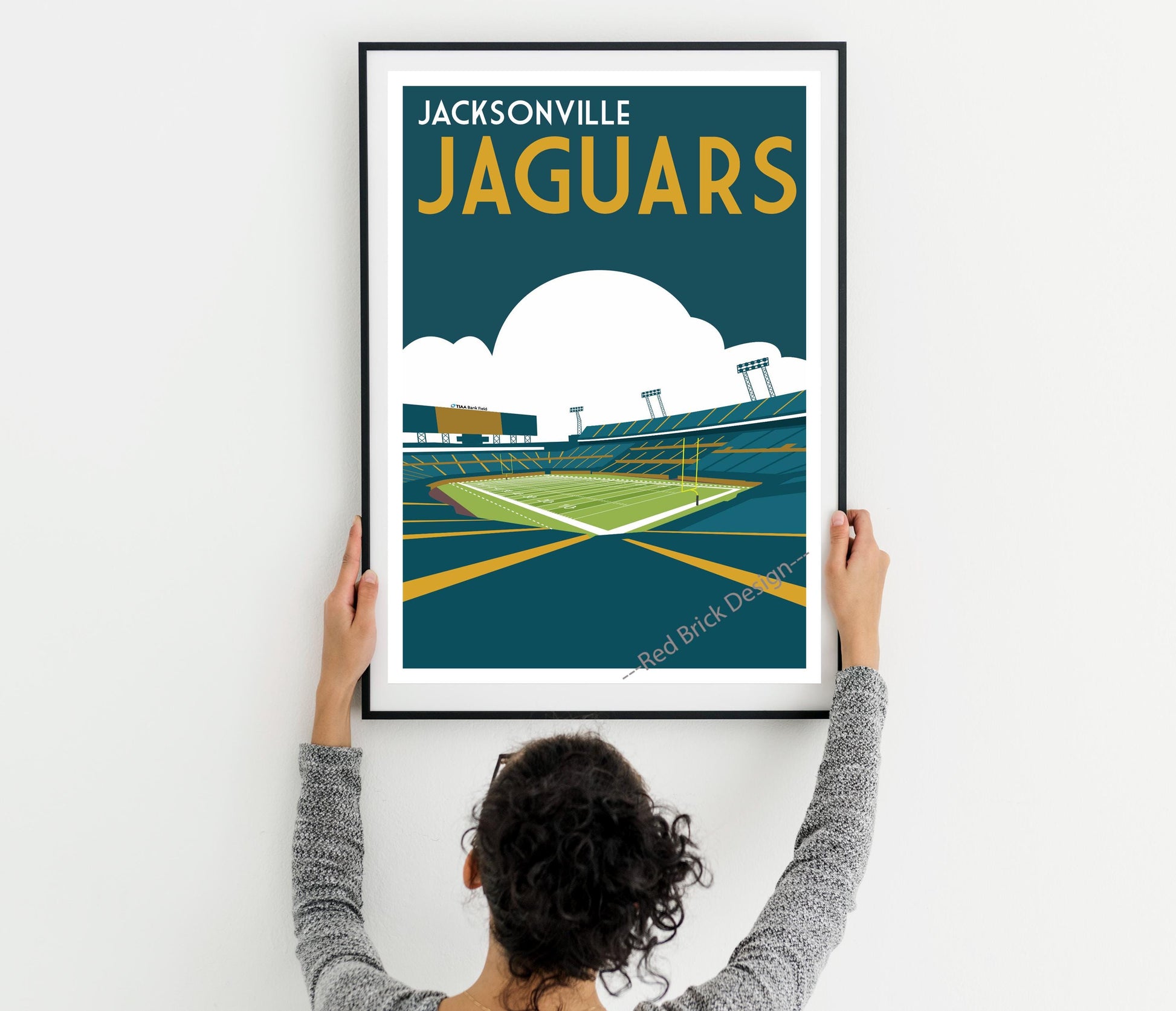 a woman holding up a poster of a tennis court