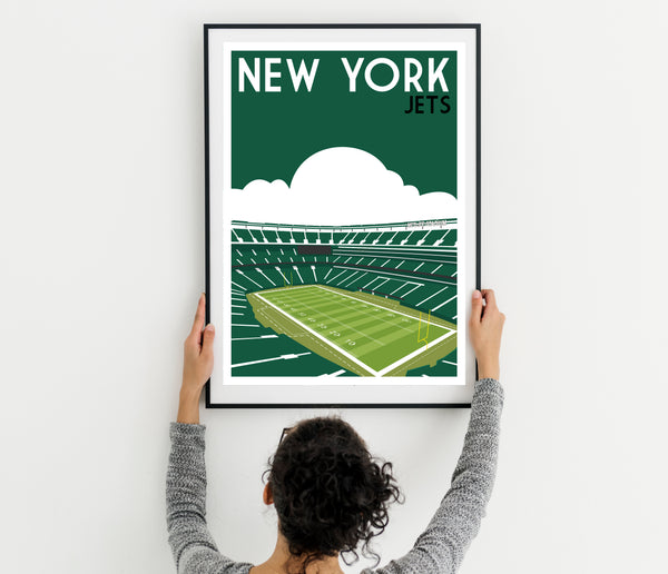 a woman holding up a poster of a tennis court