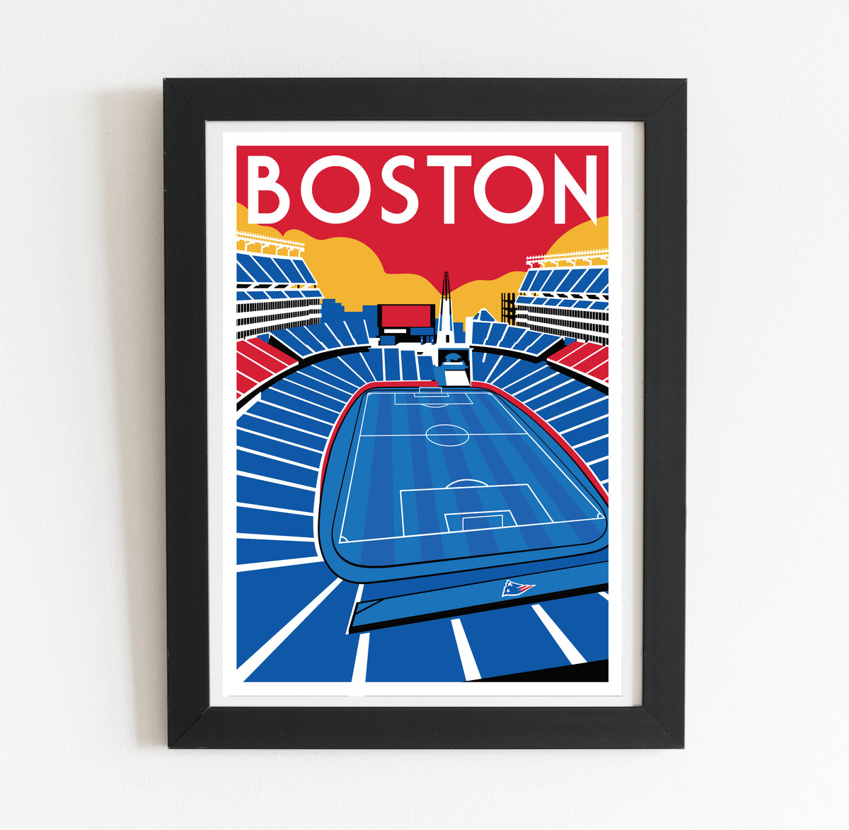A framed poster depicting a soccer field with the word "BOSTON" written above it.