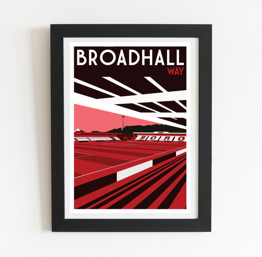 The image is a framed poster depicting a sports stadium, specifically Broadhall Way, with a red and black color scheme.