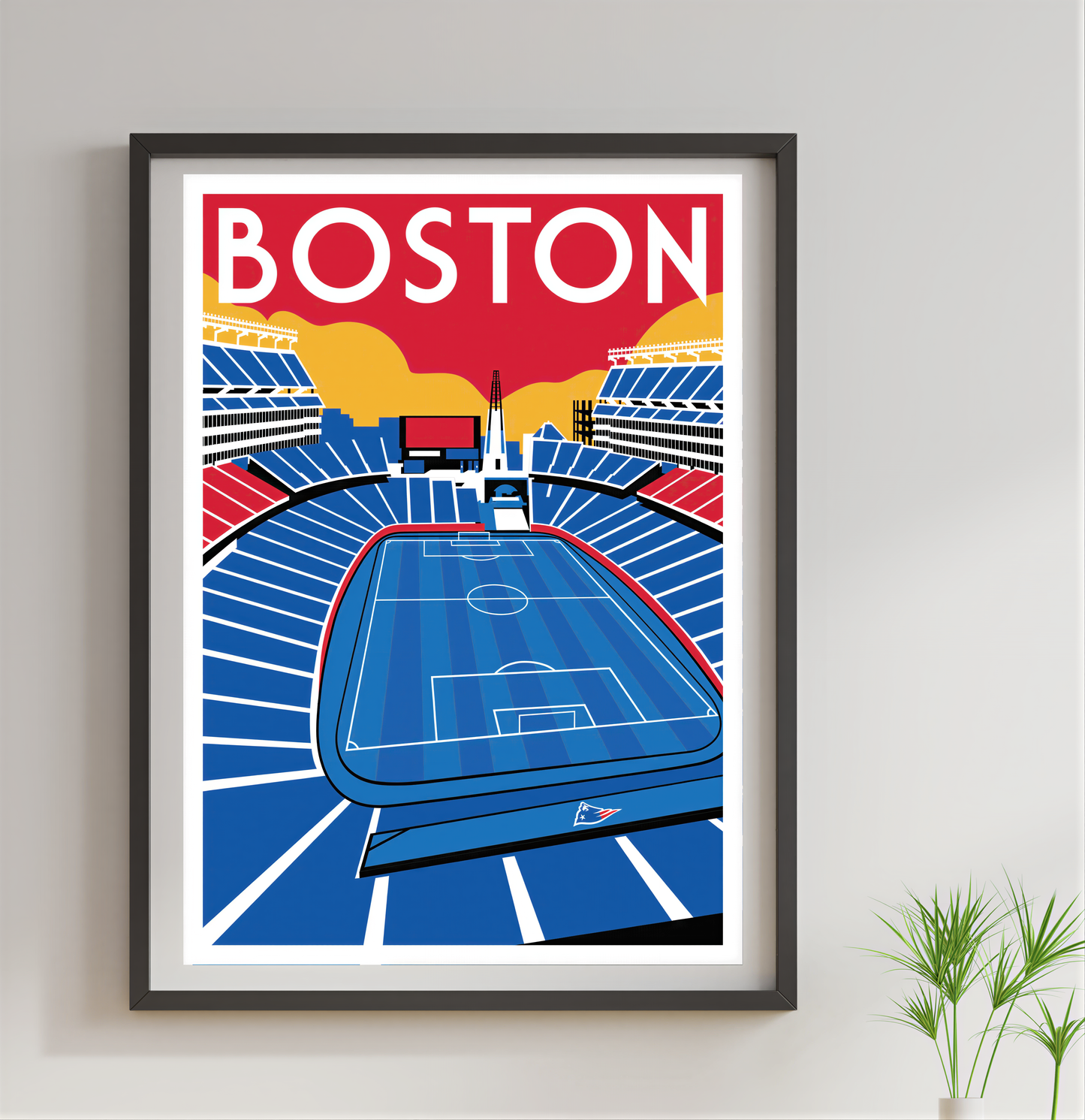 A framed poster depicting a soccer field with the word "BOSTON" written above it.