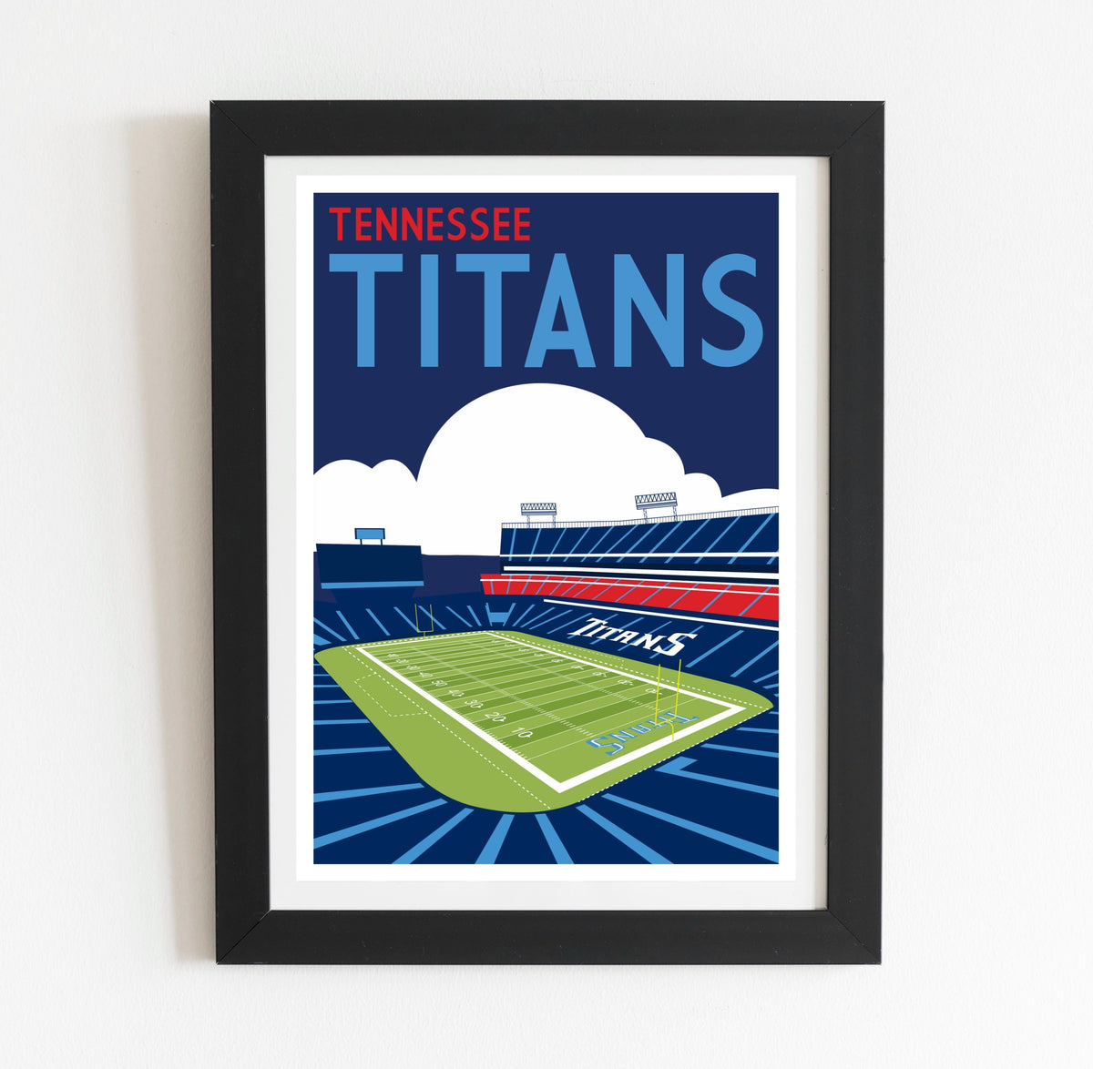 a framed poster of a football stadium