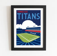 a framed poster of a football stadium