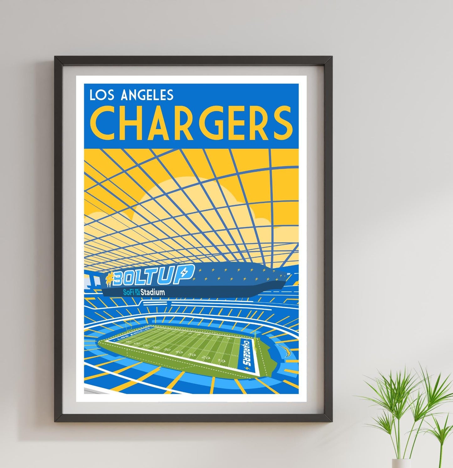 a framed poster of a stadium with the los angeles chargers on it