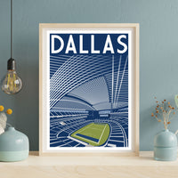 A framed poster of a stadium with a large stadium seating area and a large field, with the word "DALLAS" prominently displayed.