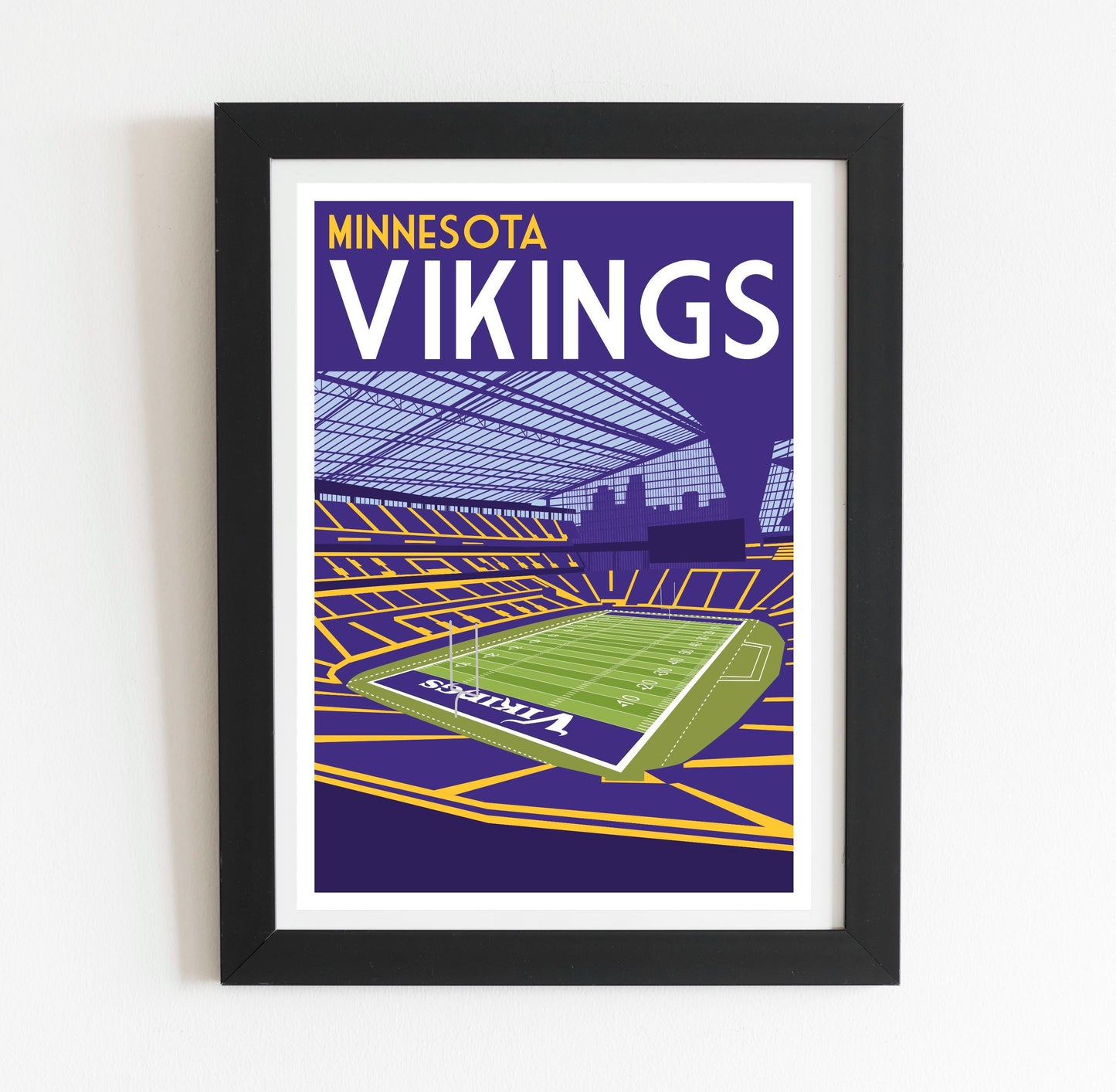 a framed poster of a minnesota vikings football stadium