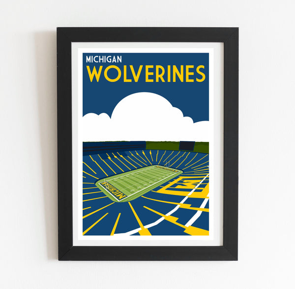 a framed poster of a tennis court with the words michigan wolverines on it