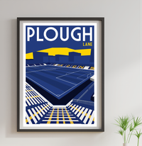 The image is a framed poster depicting a soccer stadium with a city skyline in the background.