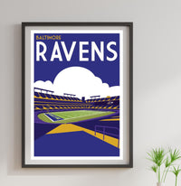 a framed poster of a football stadium