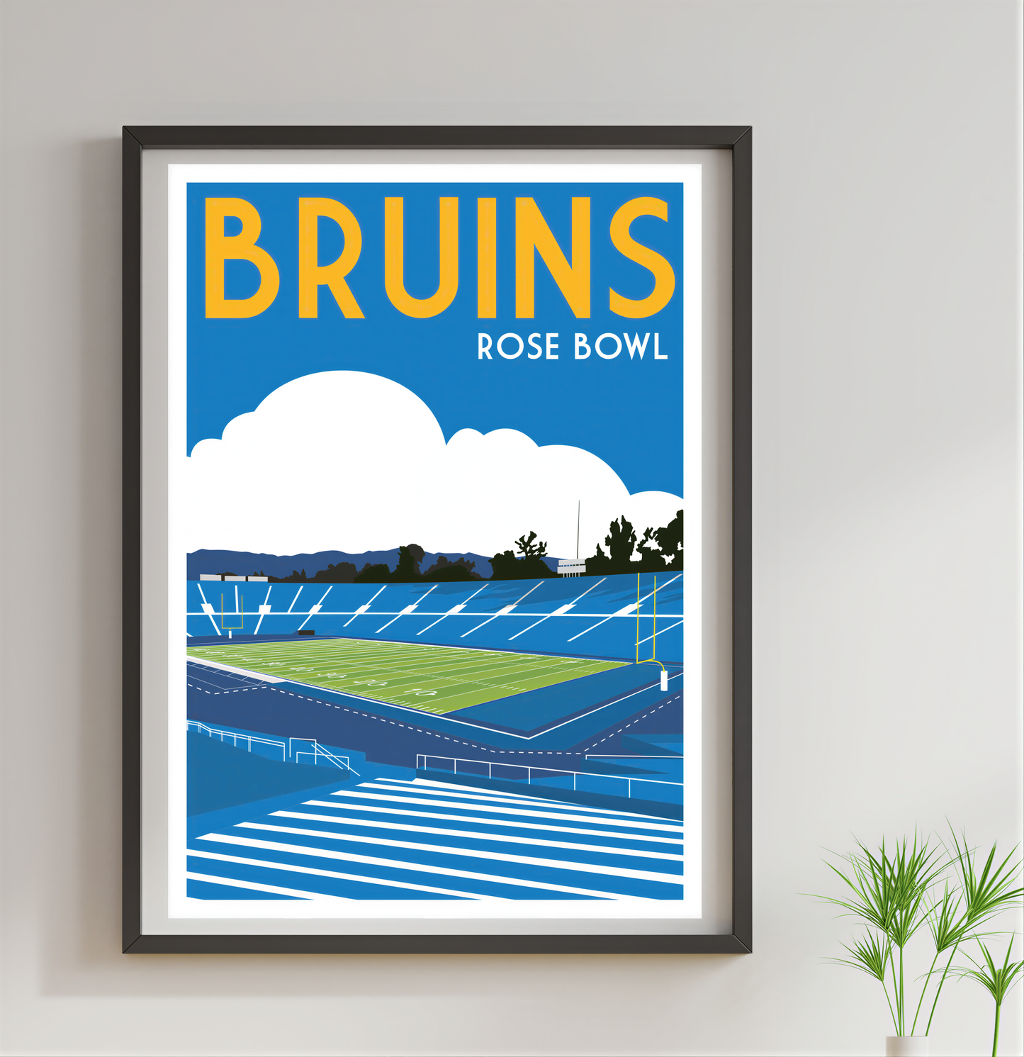 The image is a framed poster depicting a sports stadium, specifically the Rose Bowl, with a cloudy sky in the background.