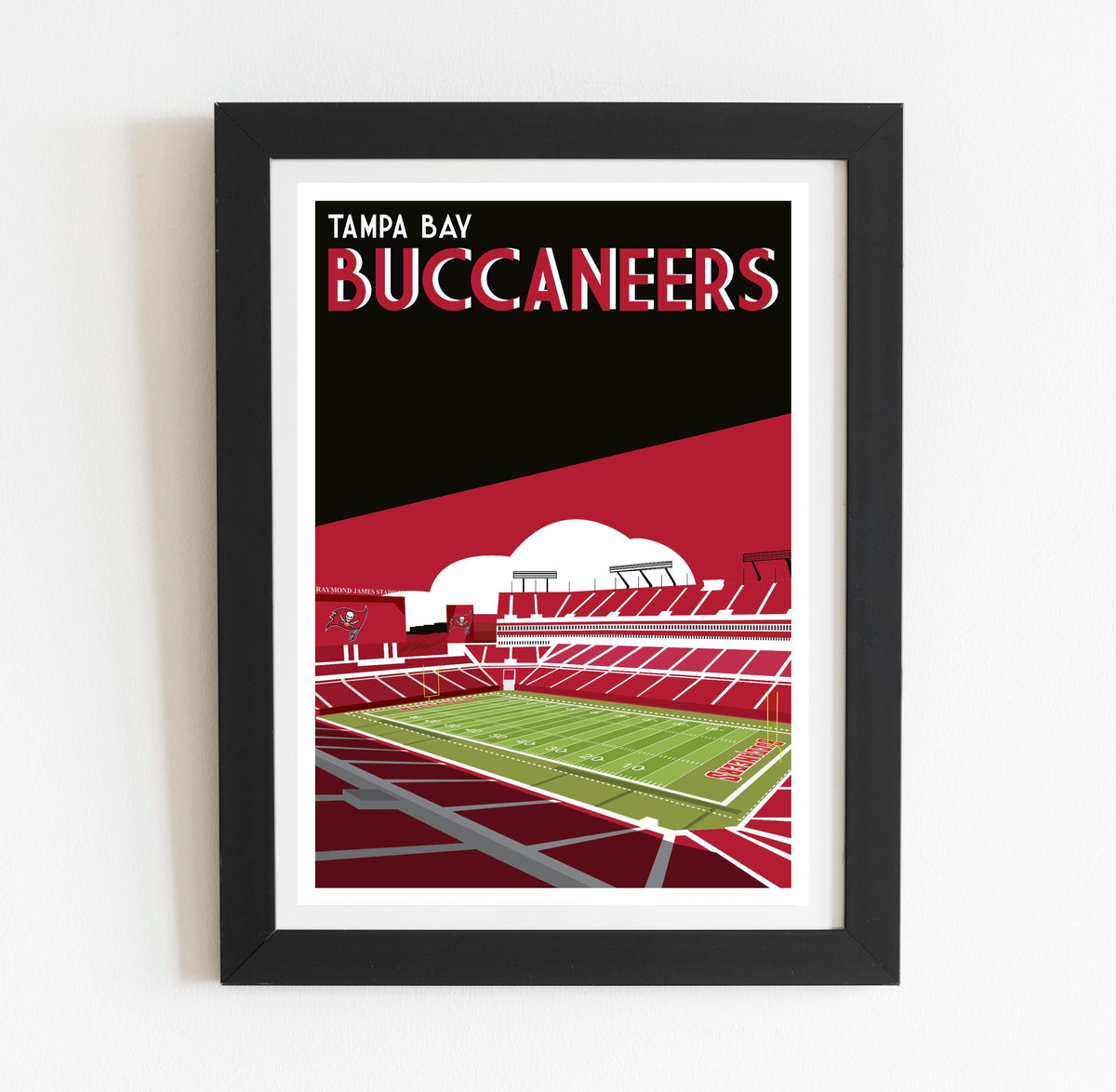 a framed poster of a stadium with a green field